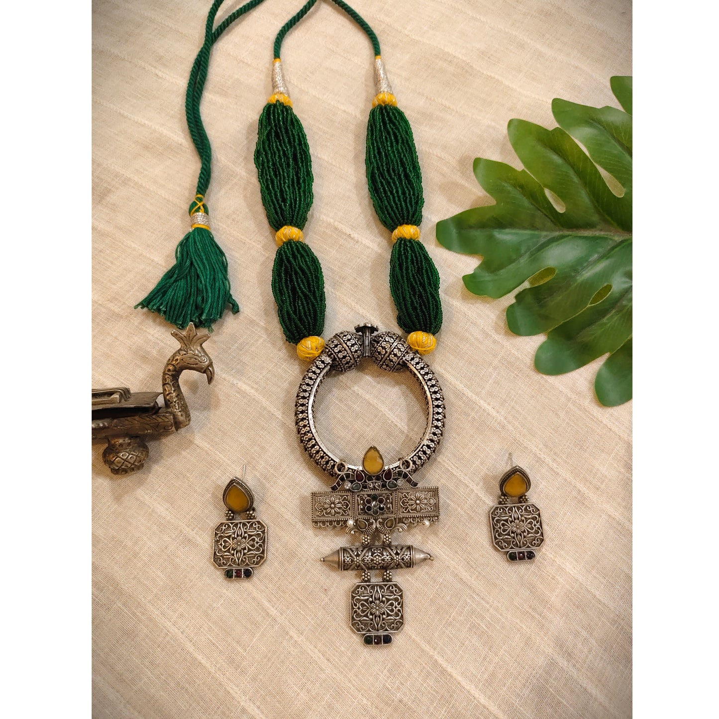 Beautiful Designer Brass Stone Embedded Pendant With Handmade Chidd Gutchha Mala And Earrings